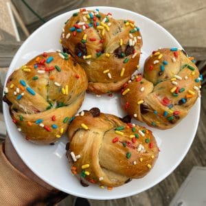 challah buns on plate