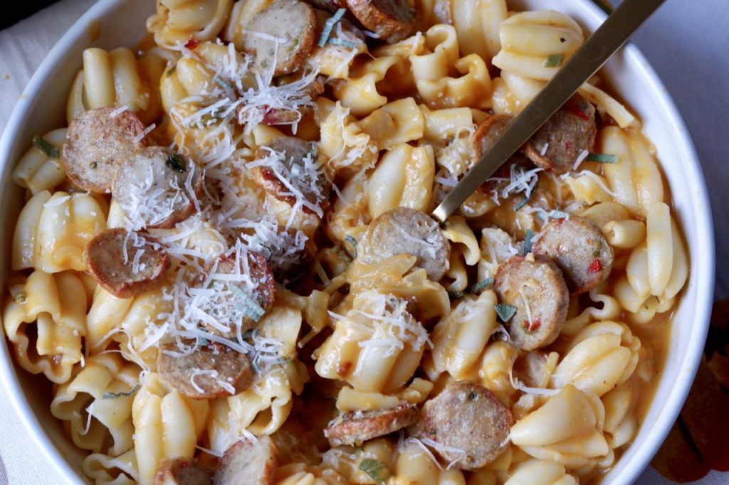 creamy pumpkin pasta with crispy sausage